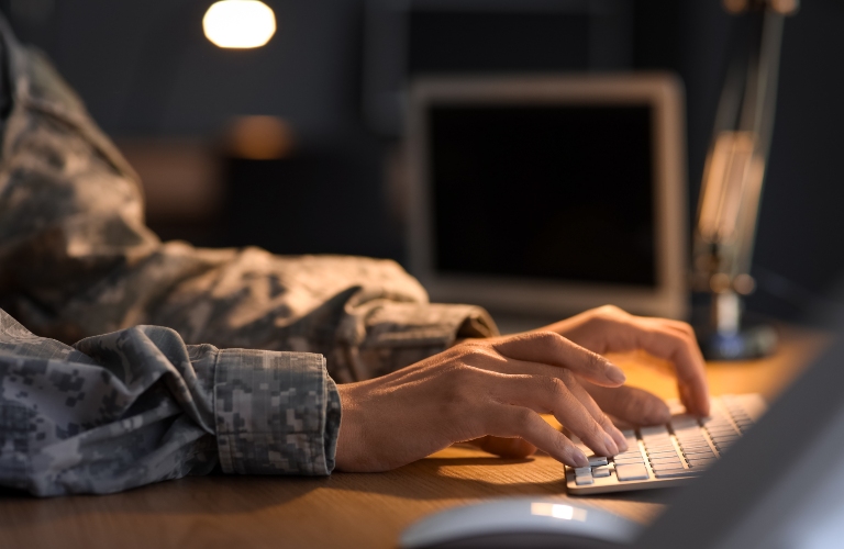 veteran searches for something on the computer