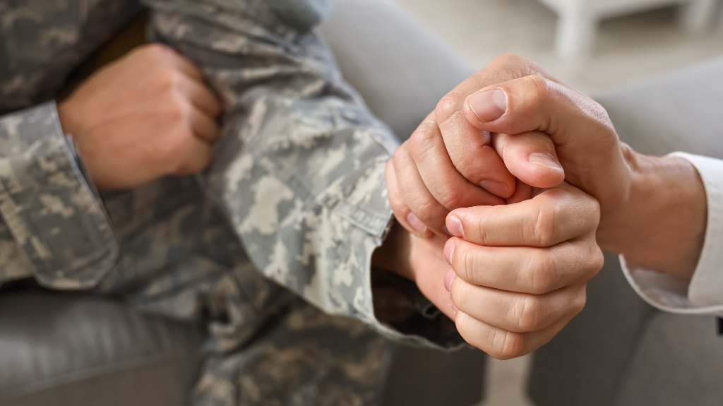lawyer is calming soldier during conversation