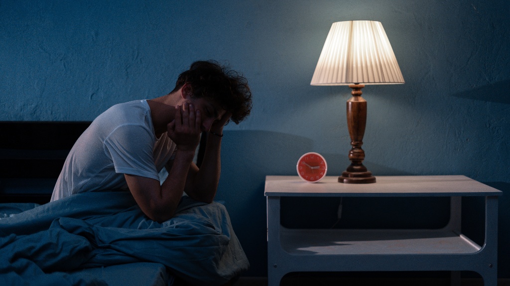 man suffering from sleep apnea