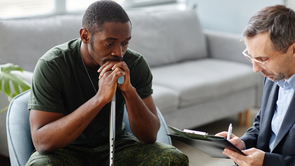 veteran is consulting with lawyer