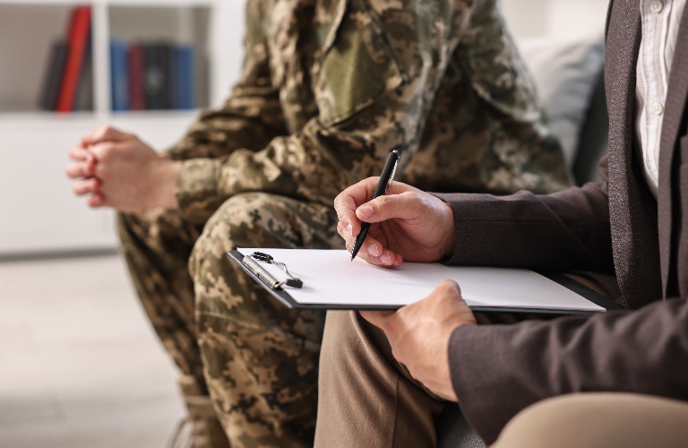 veteran is consulting with lawyer