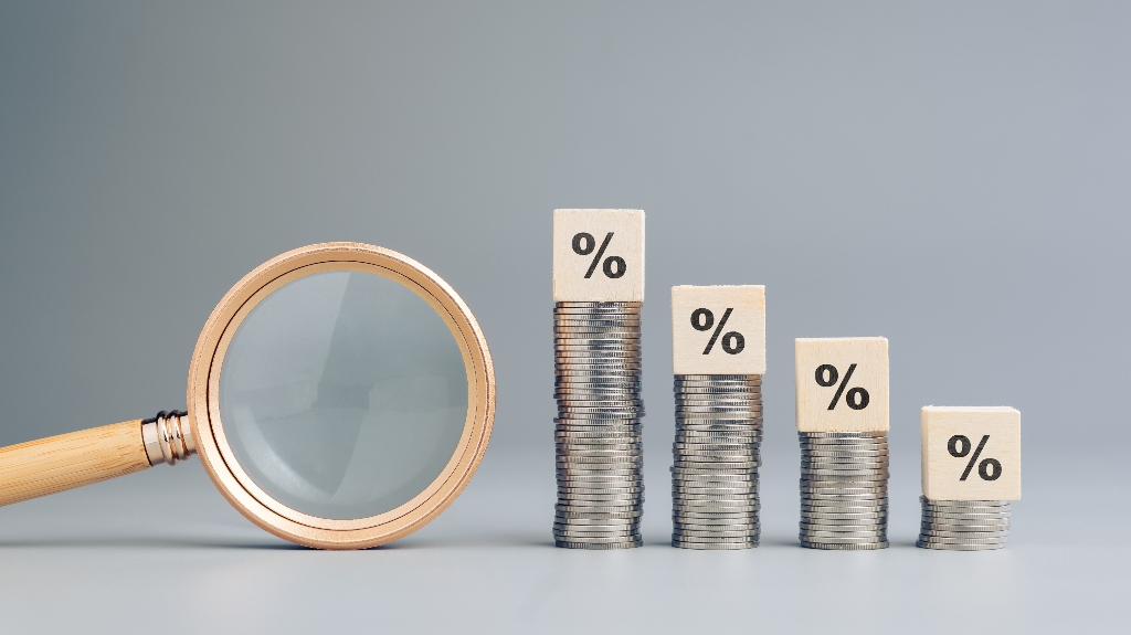 Decreasing money heaps with percentage icon