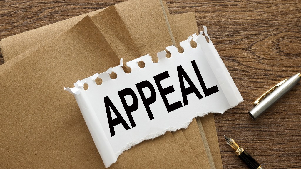 Appeal text on torn paper