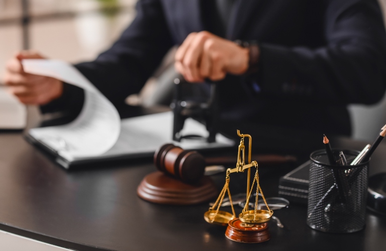 Lawyer is putting stamp on the document